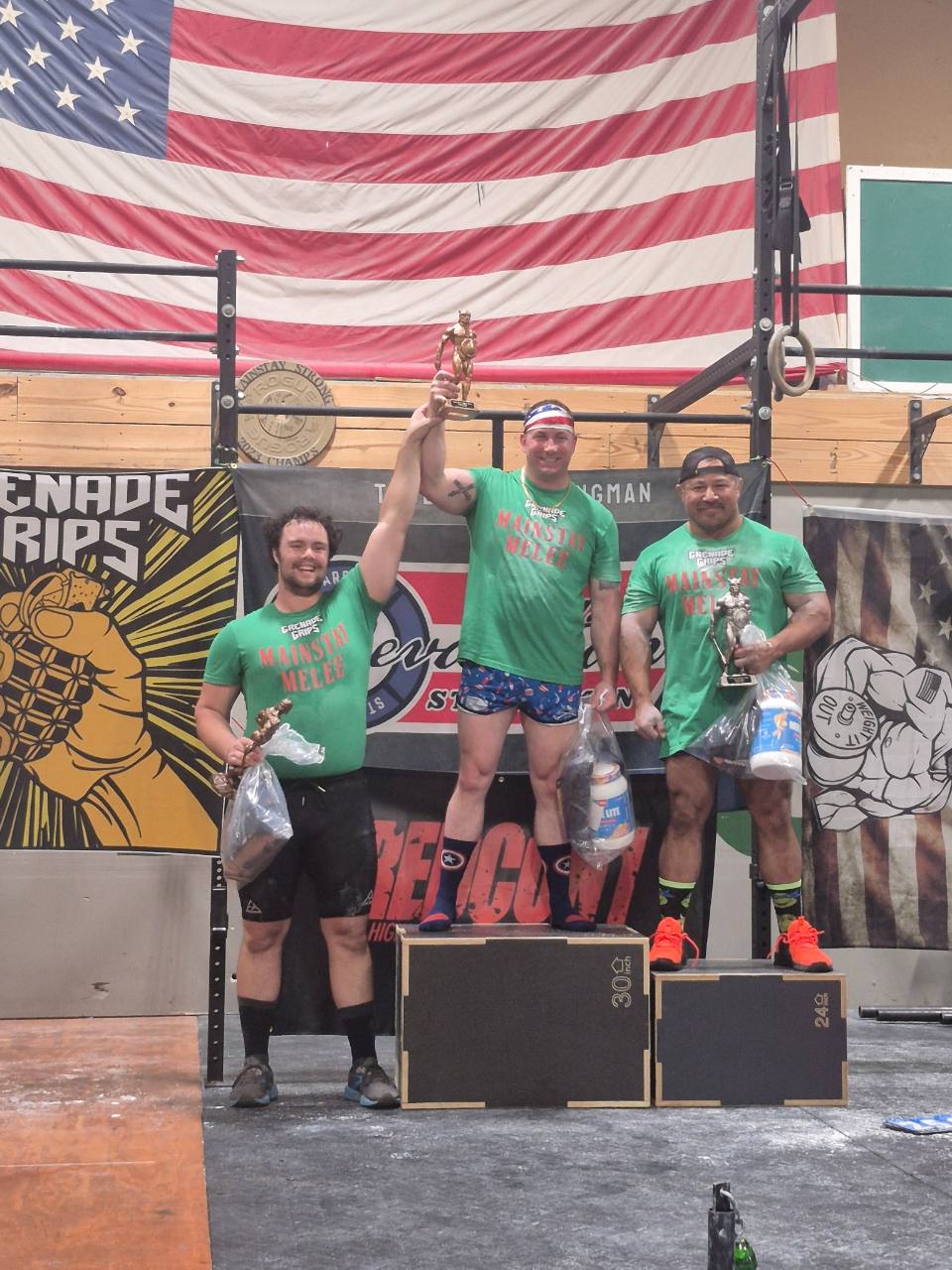 Peter Fast on the podium after placing third at the 2026 Mainstay Melee strongman competition
